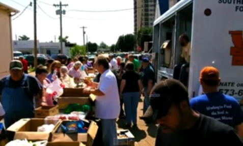 volunteers distribute food from Southeast Missouri Food Bank